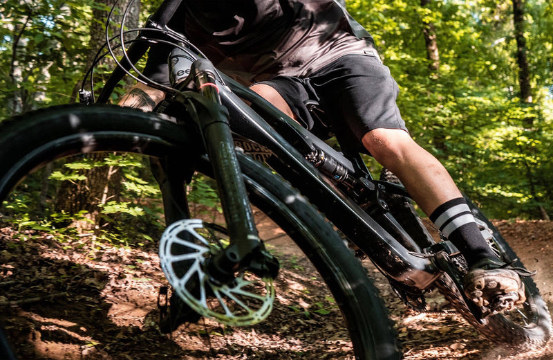 Person riding Ocoee Seclud on wooded trail