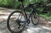 Image of Graphite Ocoee Bike on Gravel road