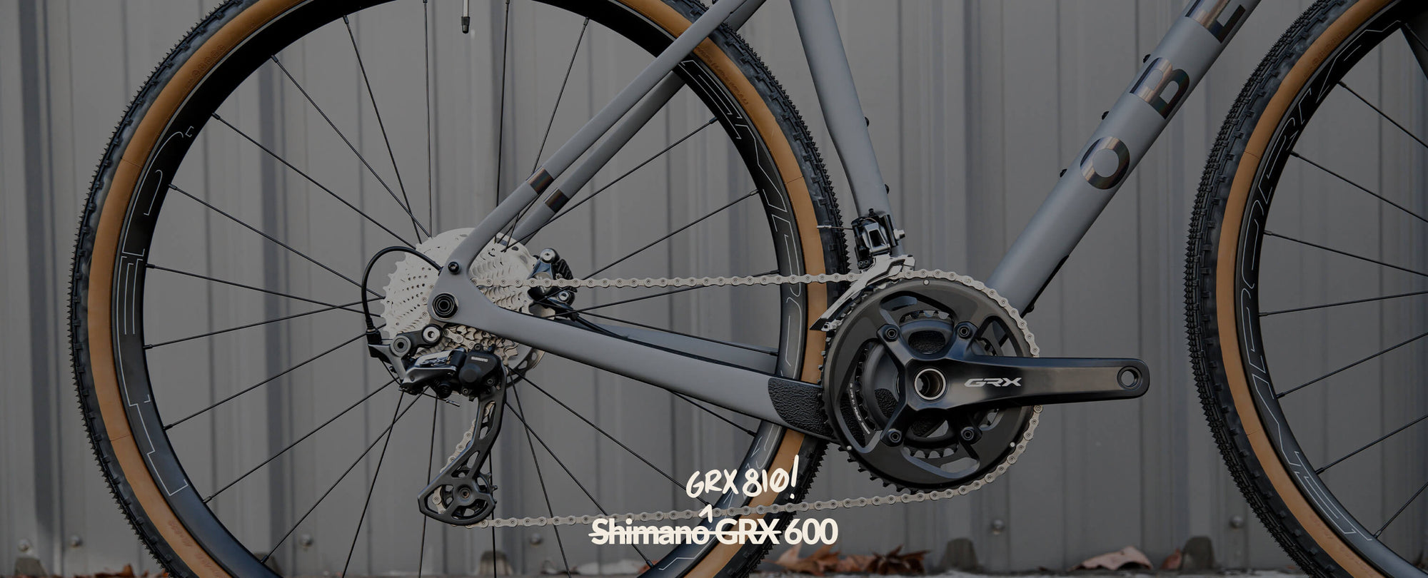 The back half of a GRX 810 with the words "Shimano GRX 600" and "GRX 810!" above the crossed out words.  	