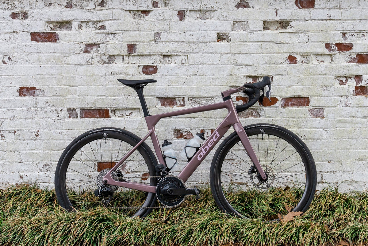 RVR leaning against a textured brick wall.
