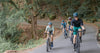 Group of riders with OBED Baseline road bike